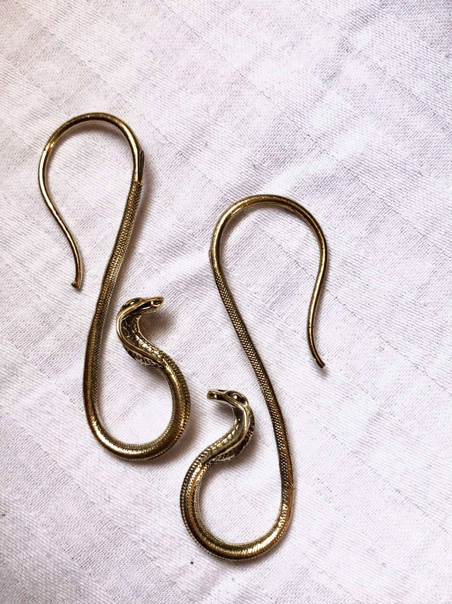 brinco नाग Nāg