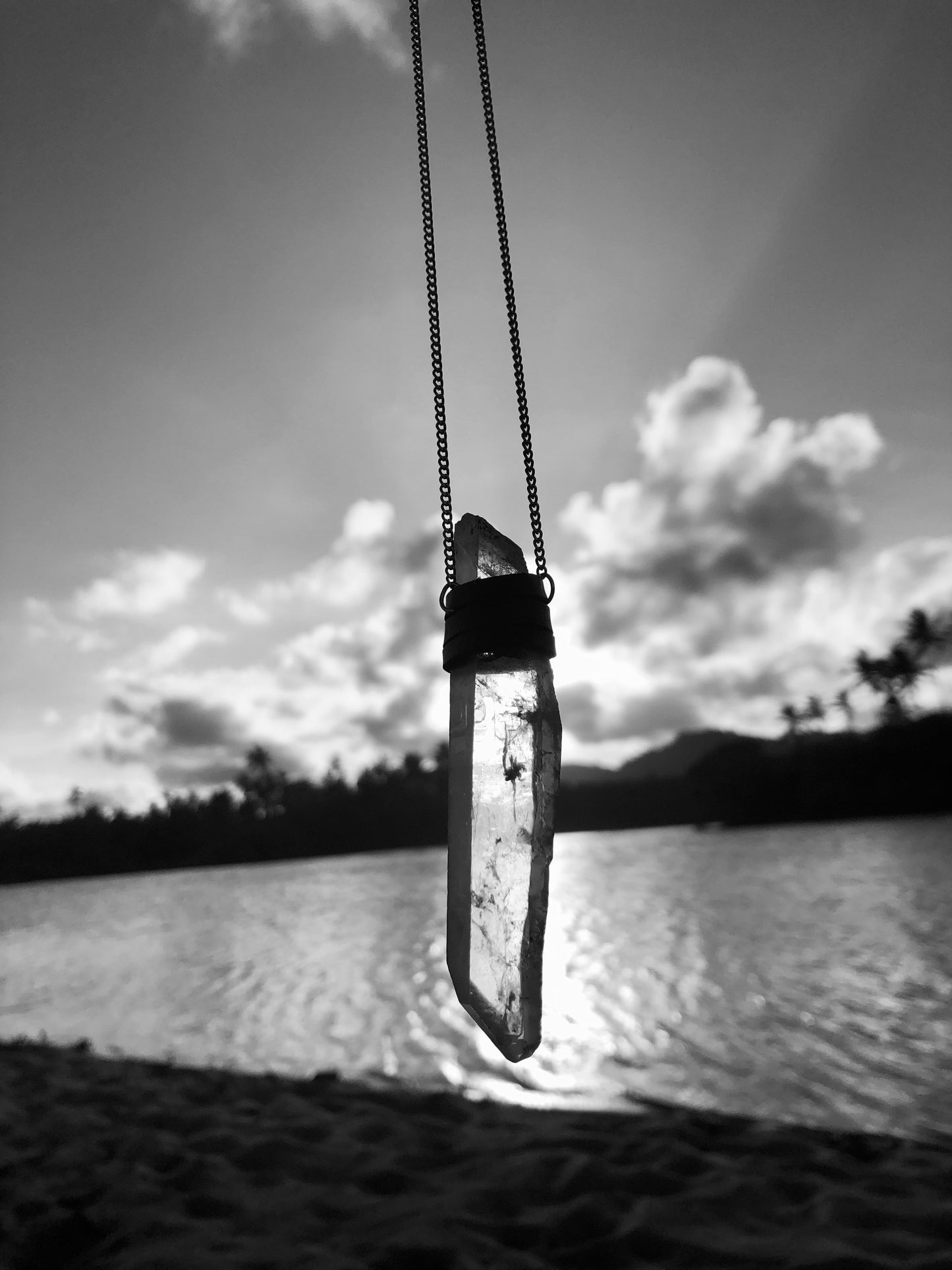 amuleto ponta de cristal